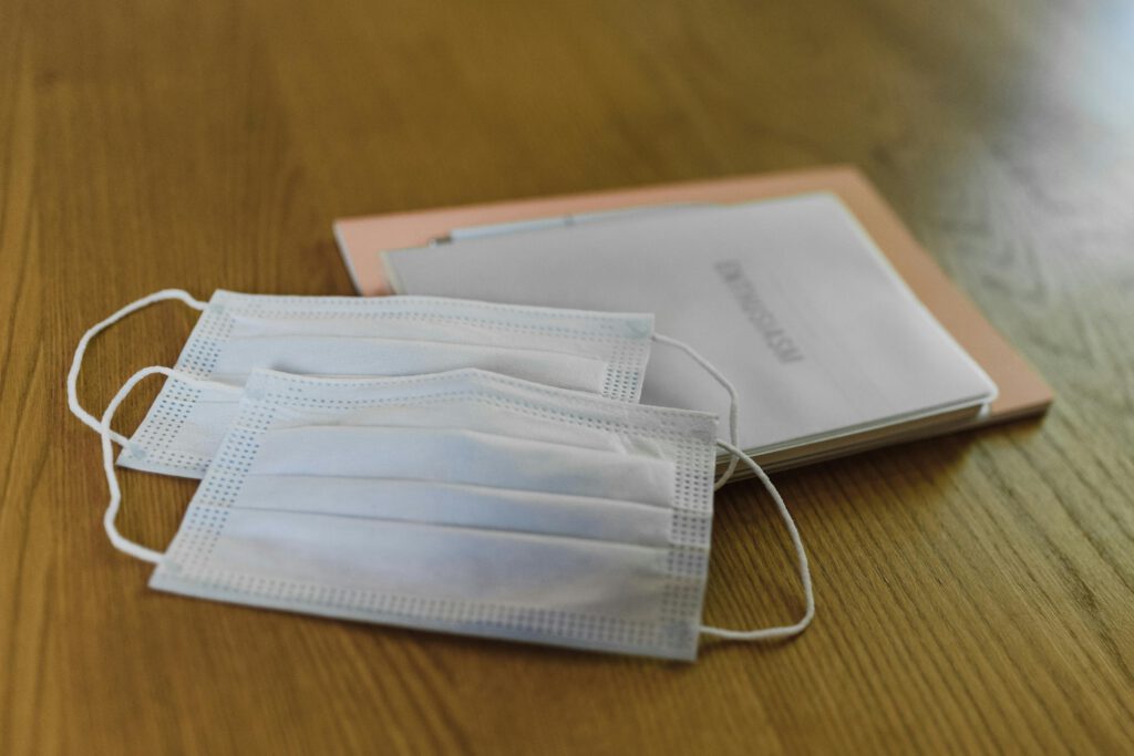 Face Masks and Documents on Table